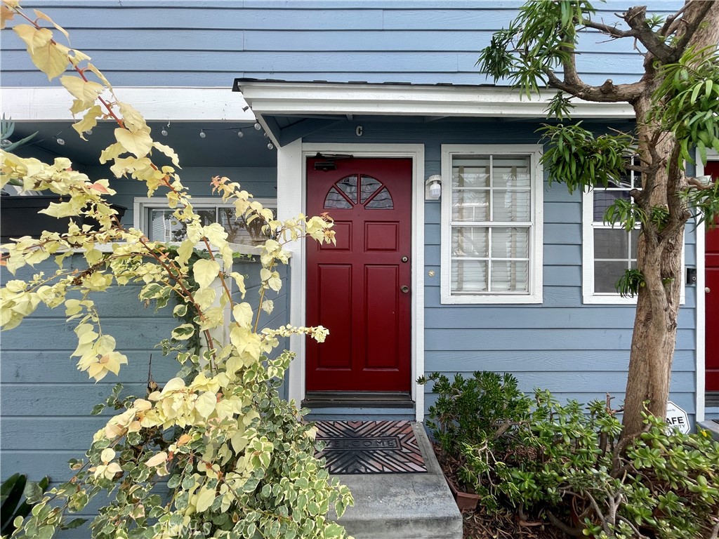 a front view of a house with a garage