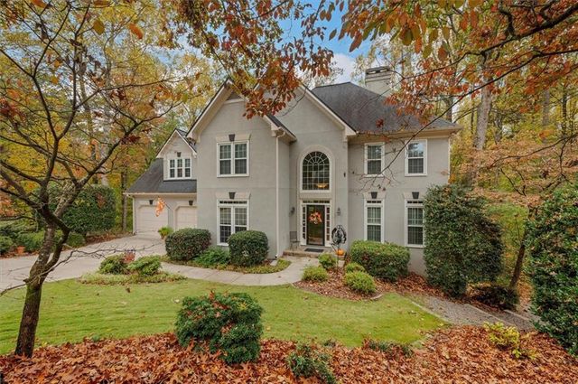 $890,000 | 3014 Oaktree Court Northeast | Windsor Oaks