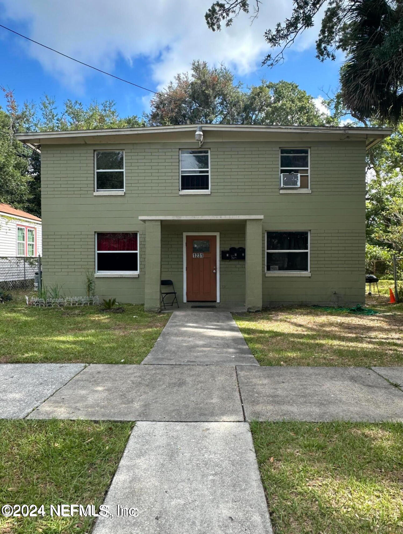 a front view of house with yard