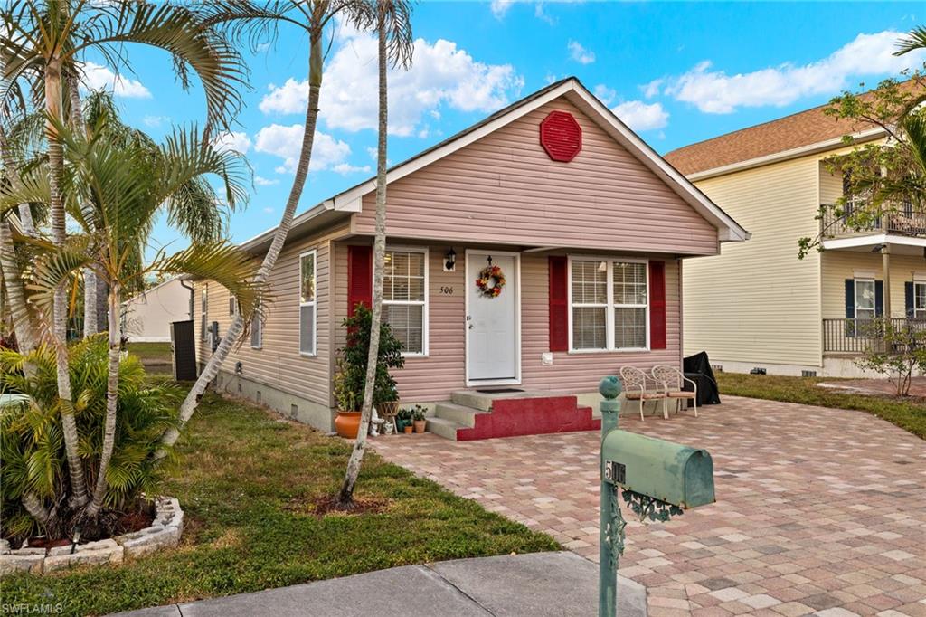 Bungalow-style home featuring a front yard