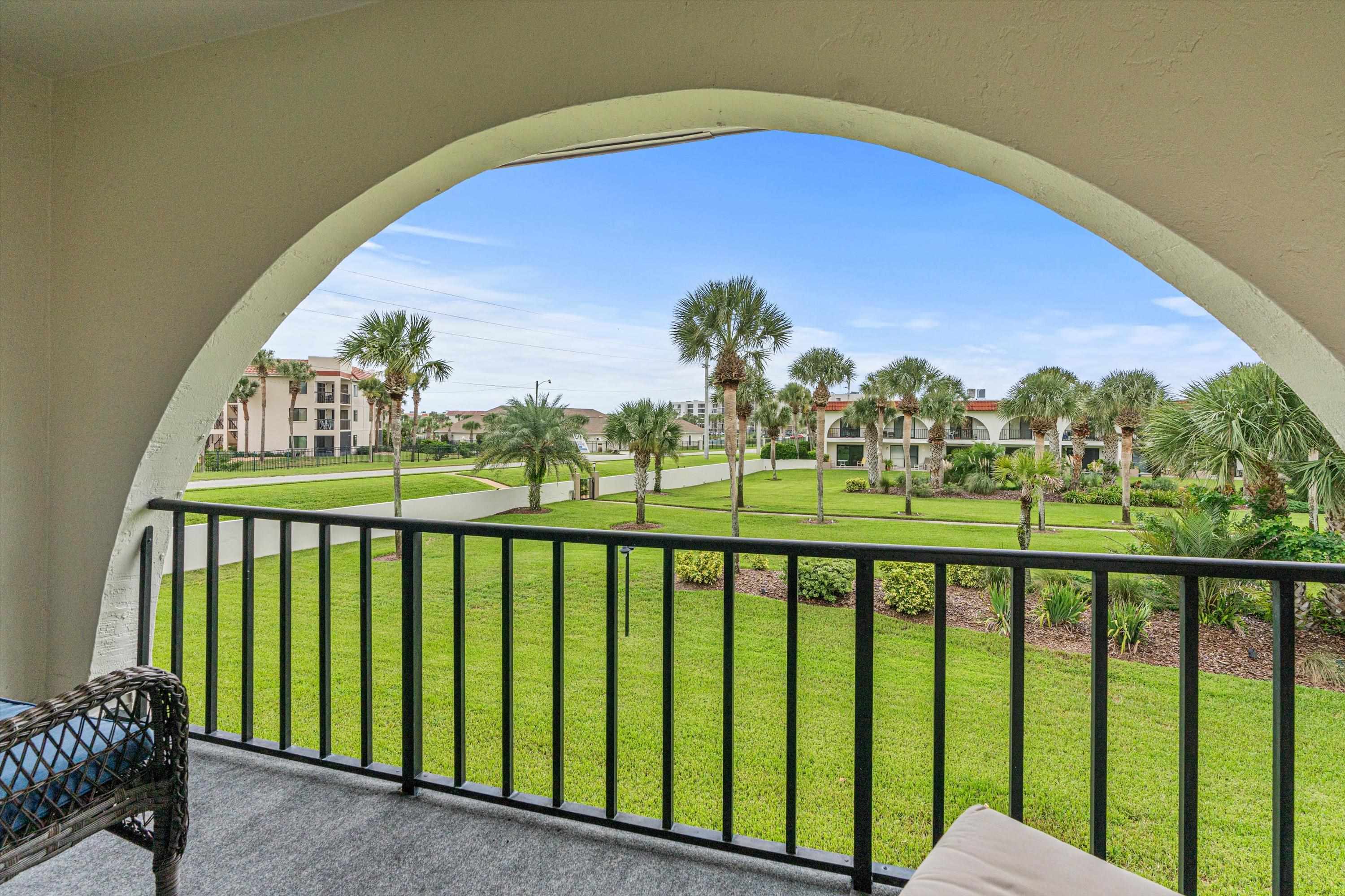 a view of a balcony with an outdoor space