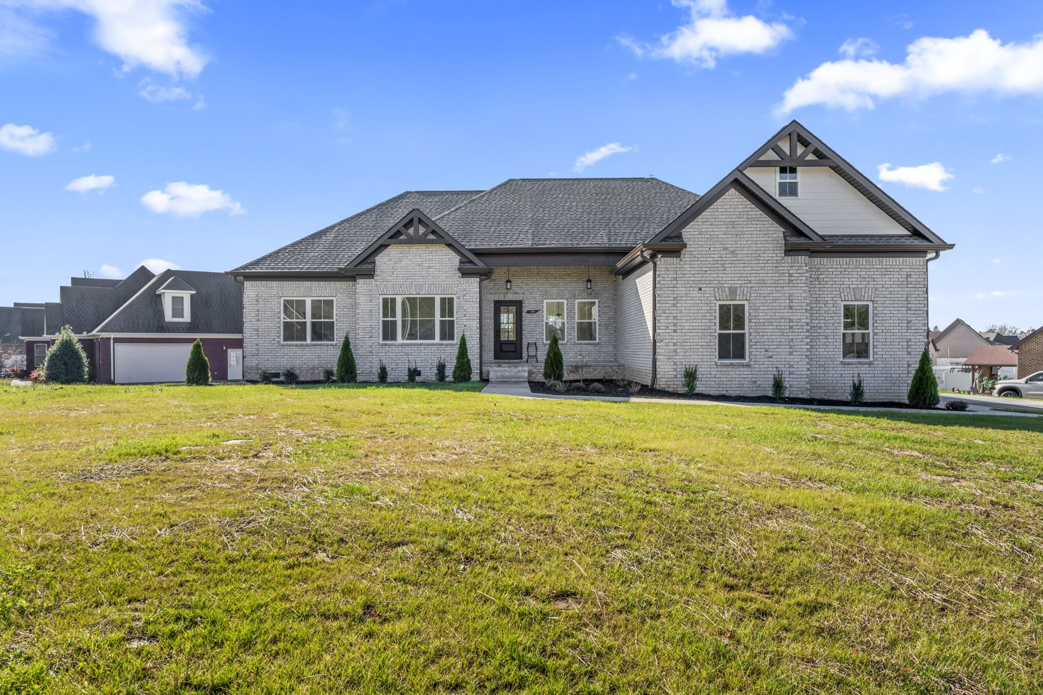 a view of a house with a yard