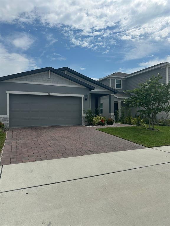 a front view of house with yard