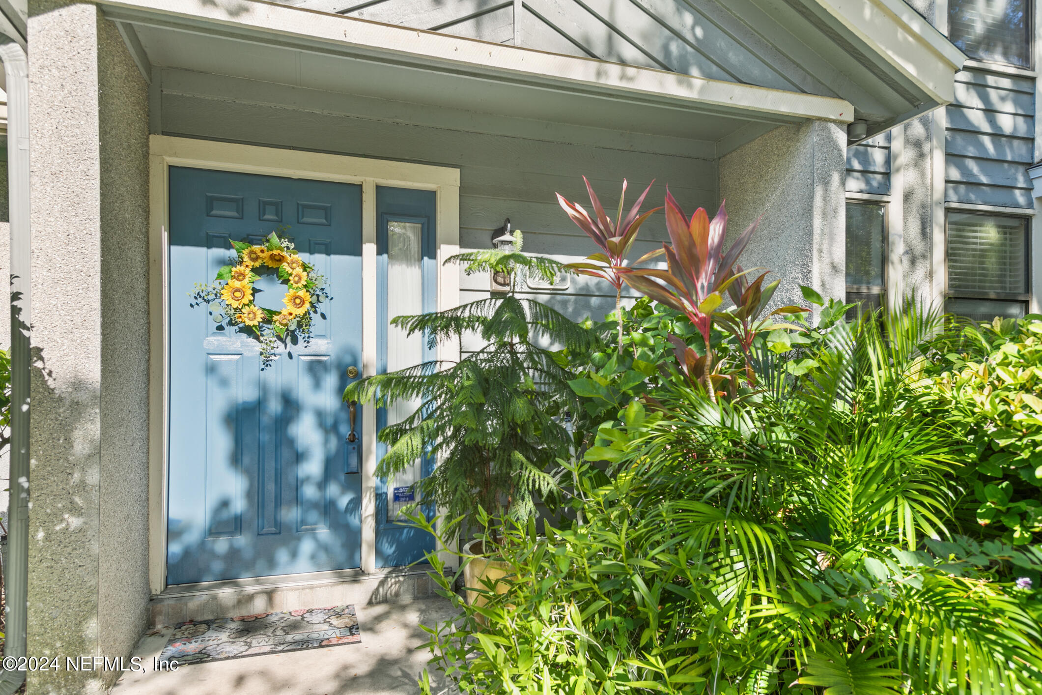 a front view of a house with yard