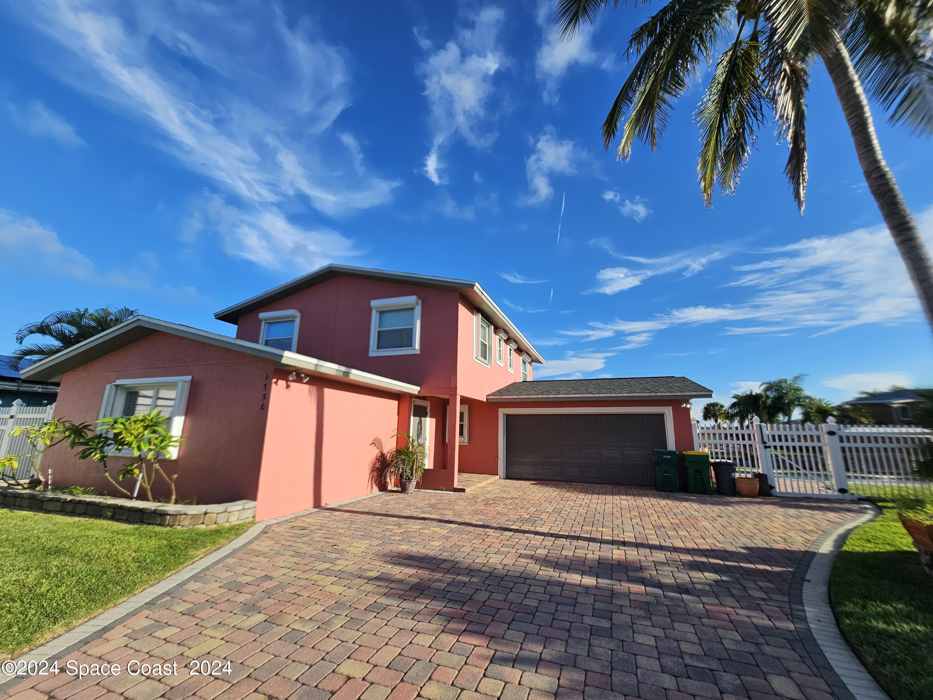 a view of a house with a patio