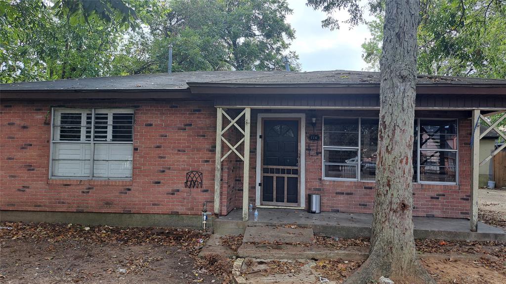 Front of House with Large Mature Trees