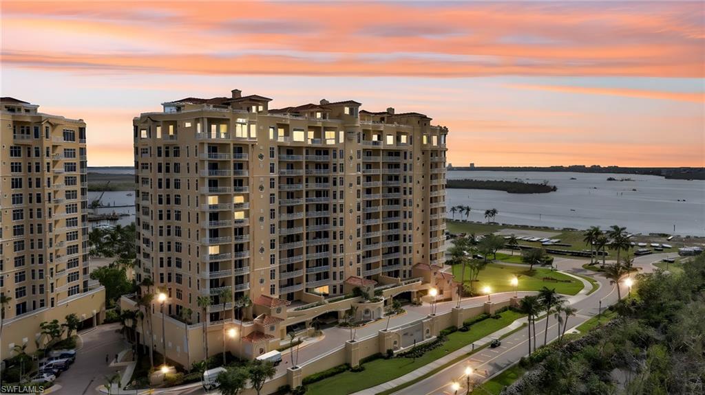 Outdoor building at dusk with a water view