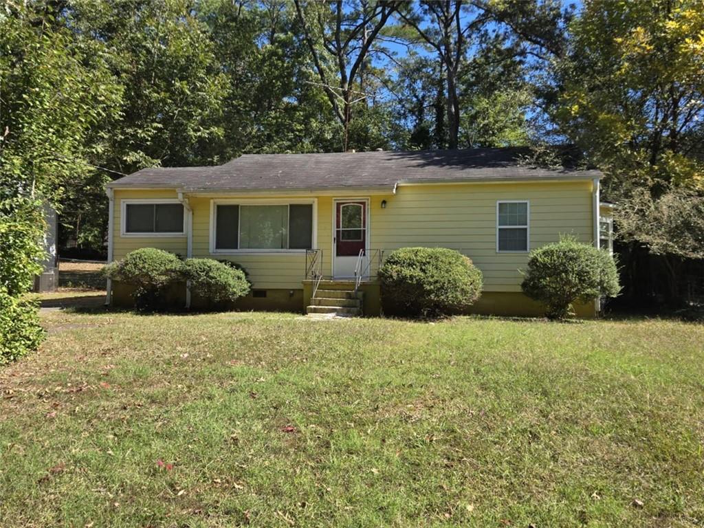 front view of a house with a yard