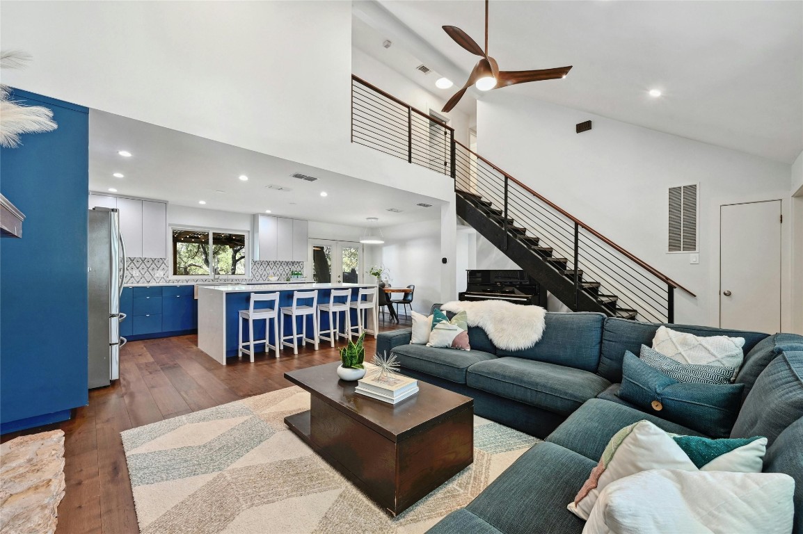 a living room with furniture and a rug