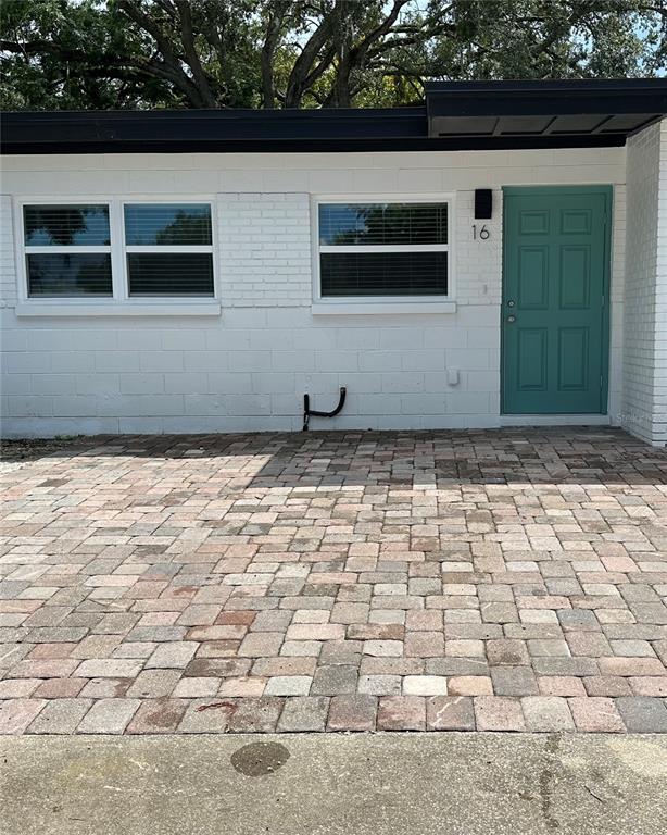 a view of a backyard of the house