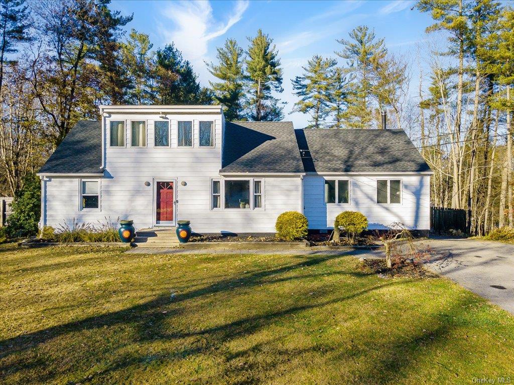 View of front of home with a front yard