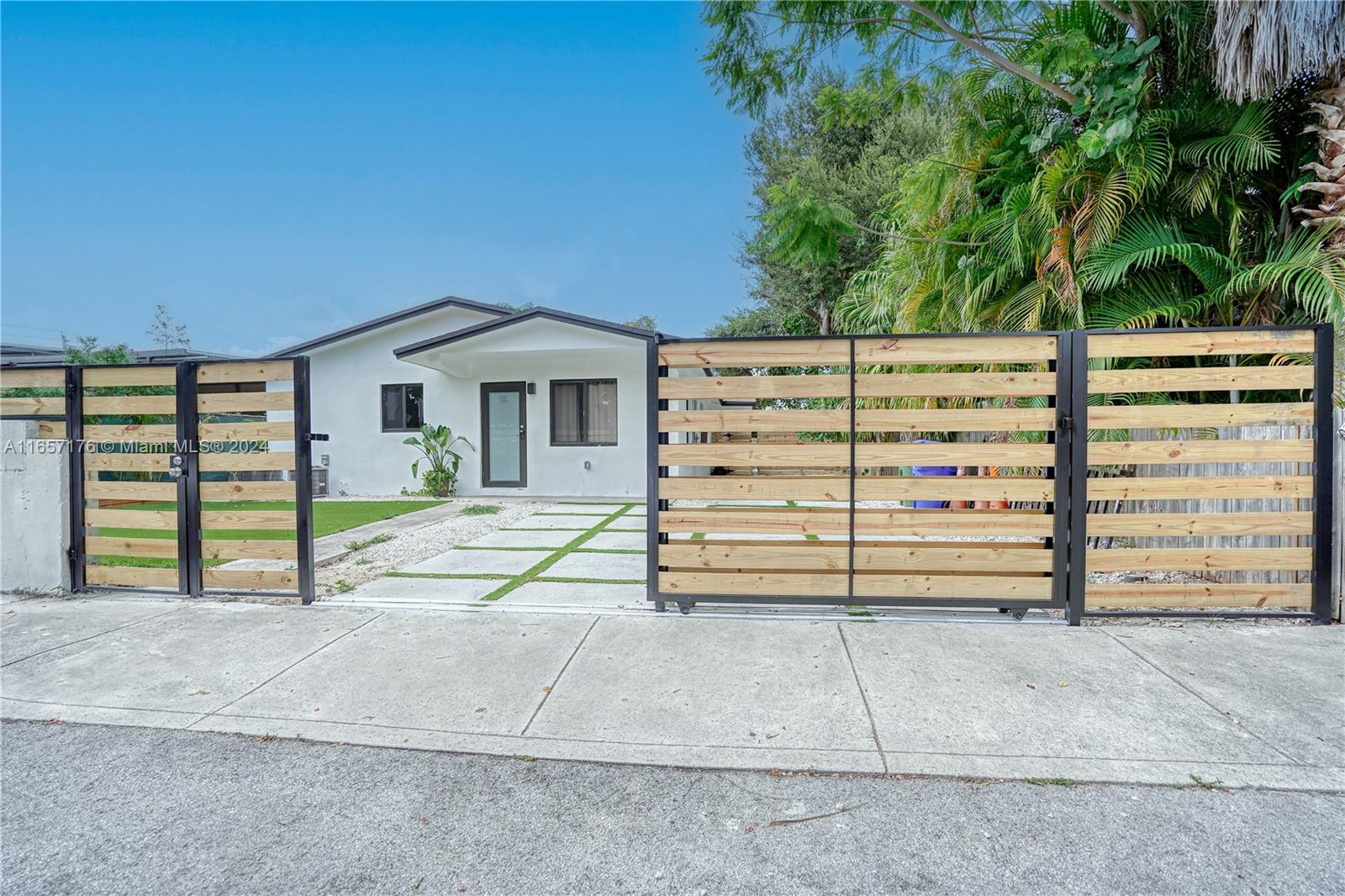 a view of a house with a garage