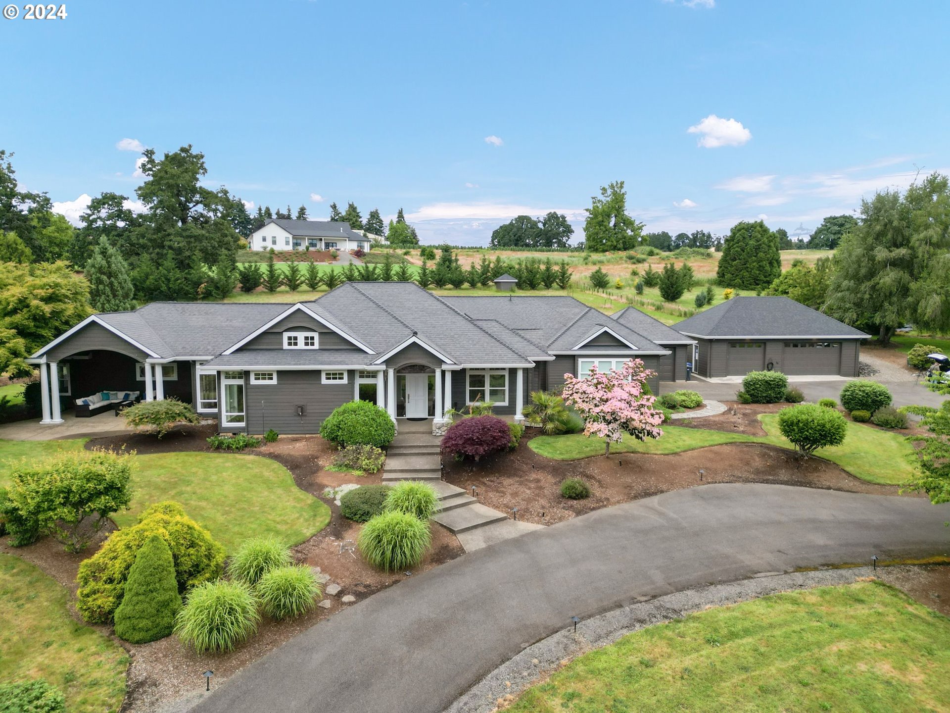 front view of a house with a yard