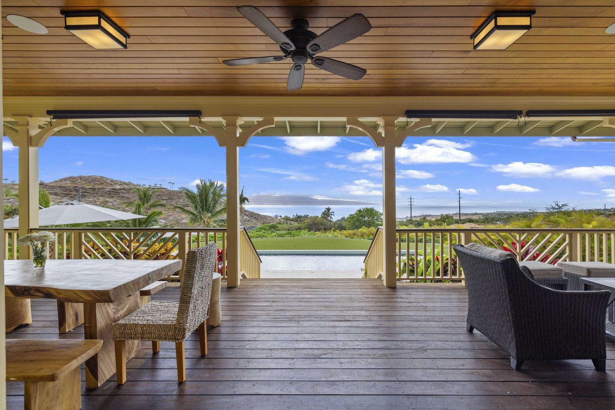 a balcony with furniture and a table