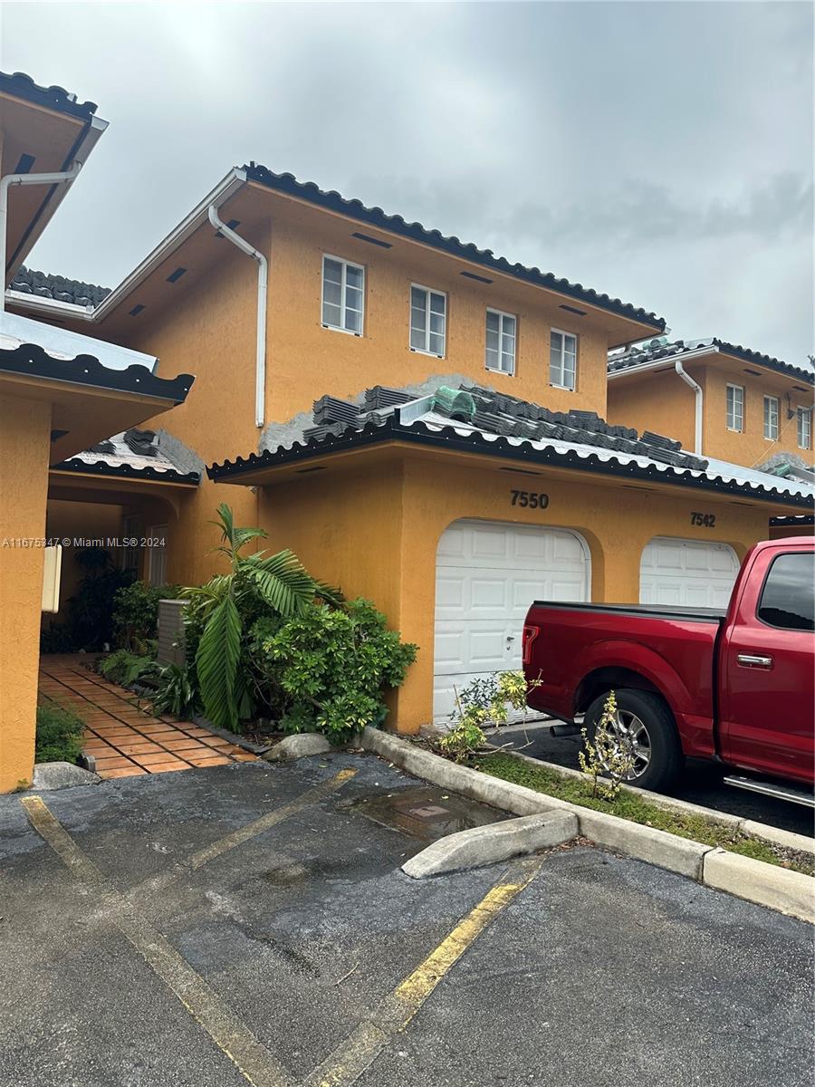 a front view of a house with yard