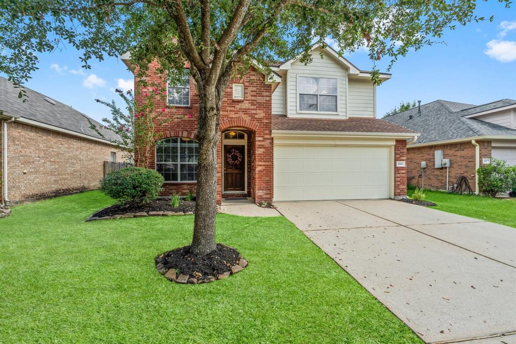 Welcome to 2943 Smokey Forest Lane in Imperial Oaks with great curb appeal, 2 car garage and double driveway.