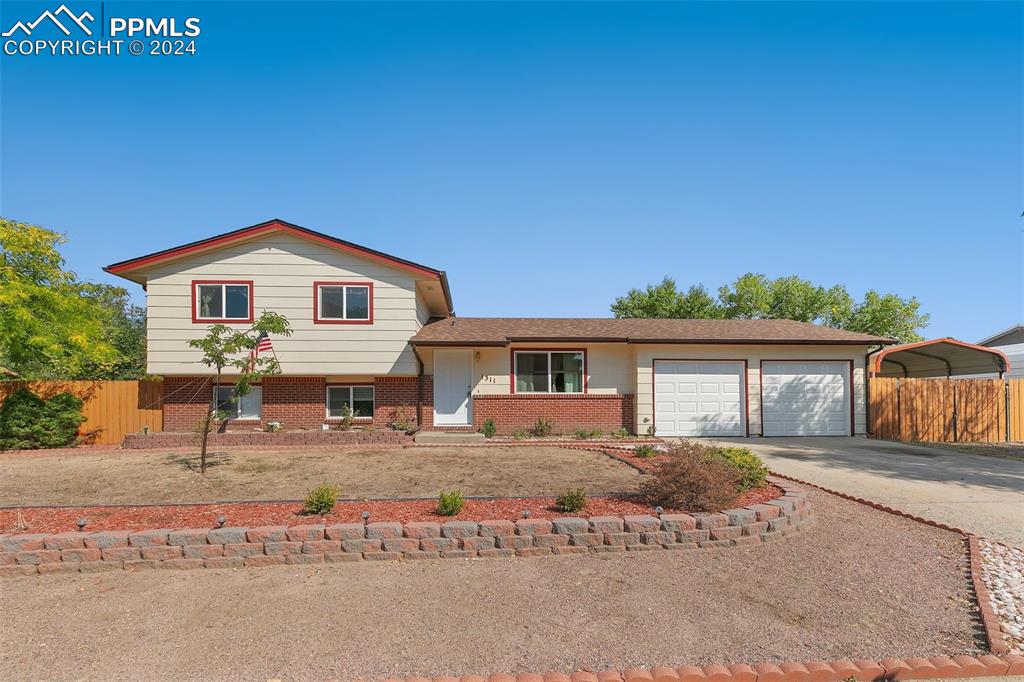 a front view of a house with entertaining space