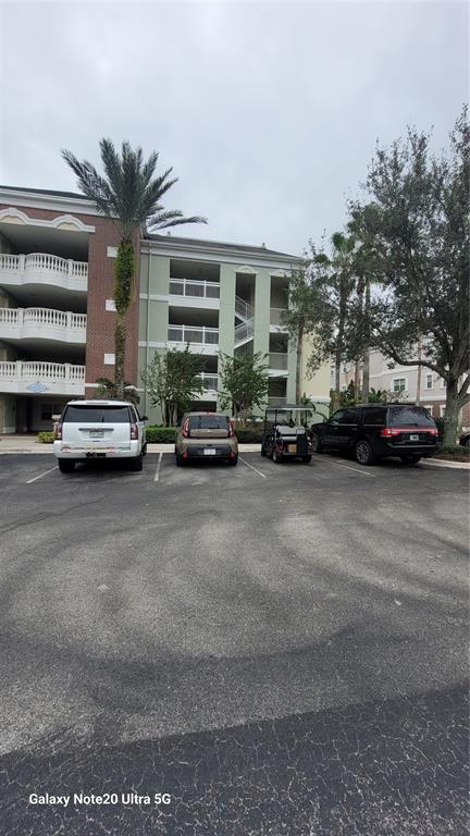 a view of car parked in front of house