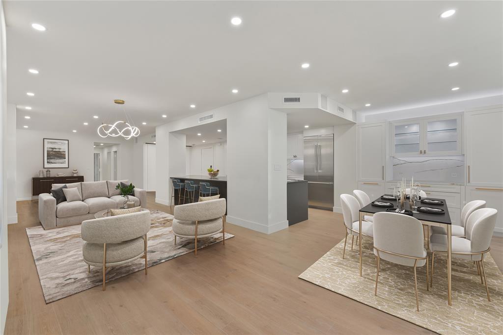 Beautifully appointed, the sophisticated floorplan offers  an effortless flow. Rewired, replumbed , and totally reimagined in 2023, this  penthouse  unit was thoughtfully restructured with custom cabinetry, unique finishes, and expansive storage. Virtually Staged.