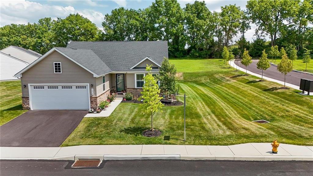 a house view with a garden space