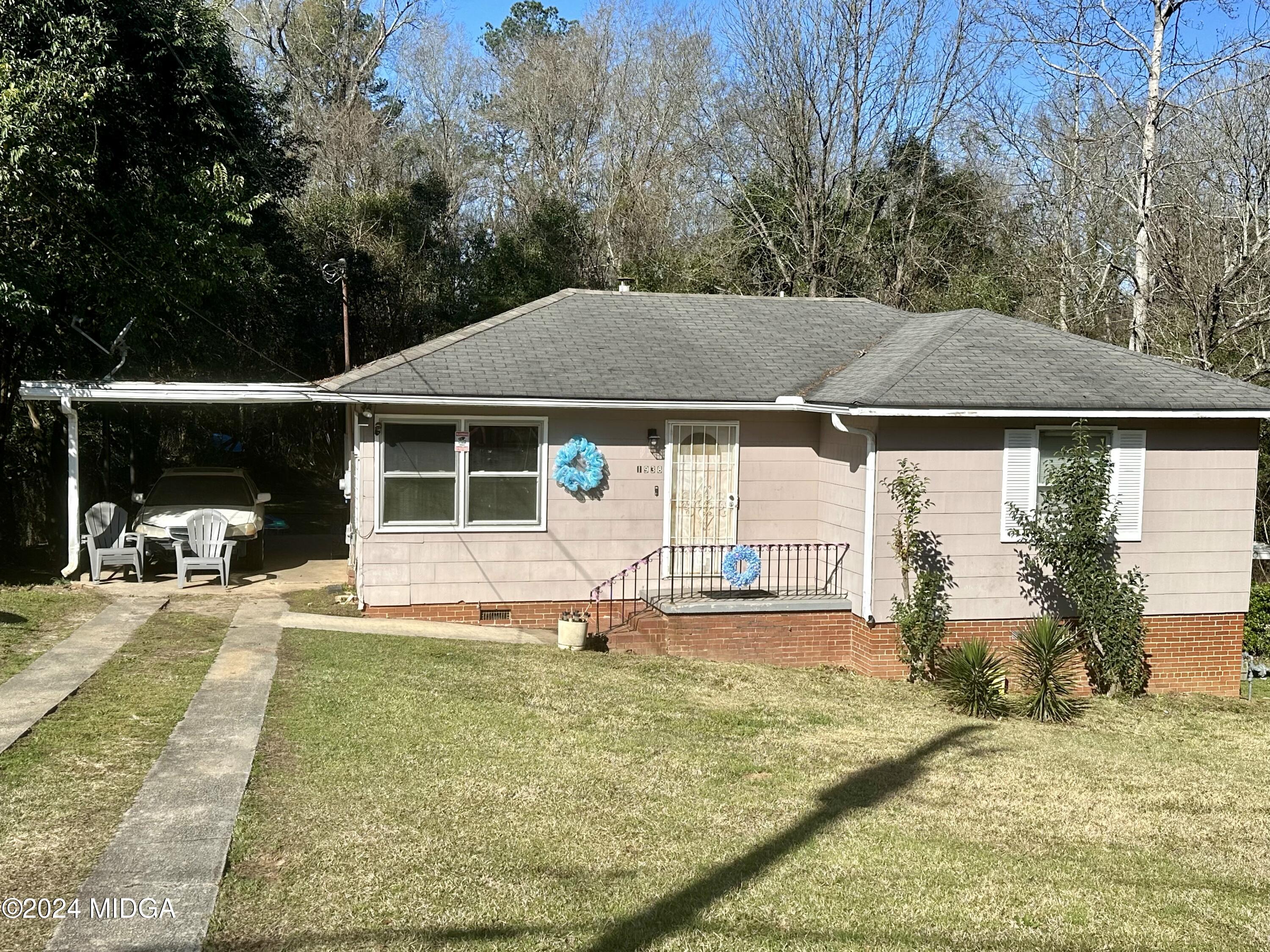 a house view with a garden space