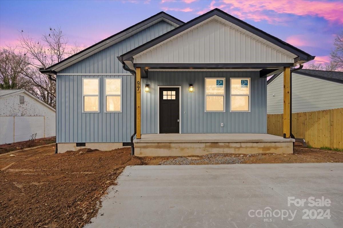 a front view of a house with a outdoor space