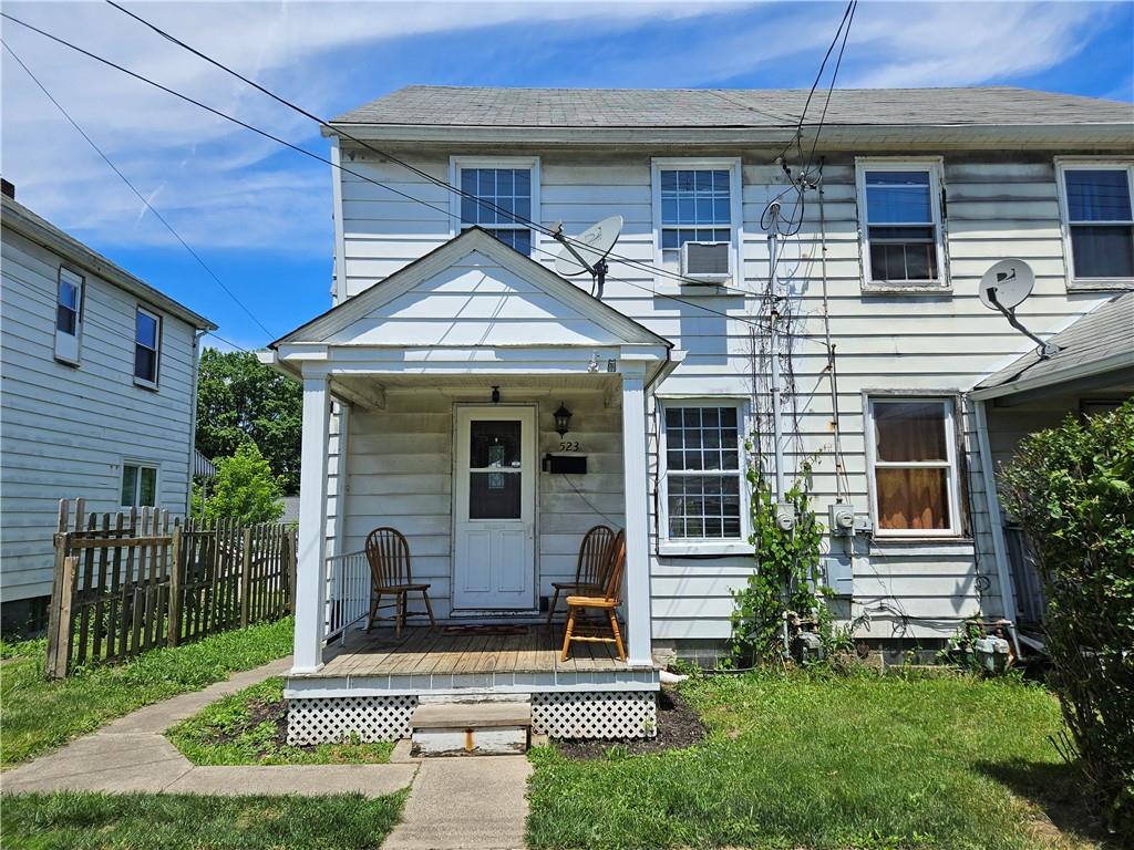 a front view of a house with a porch