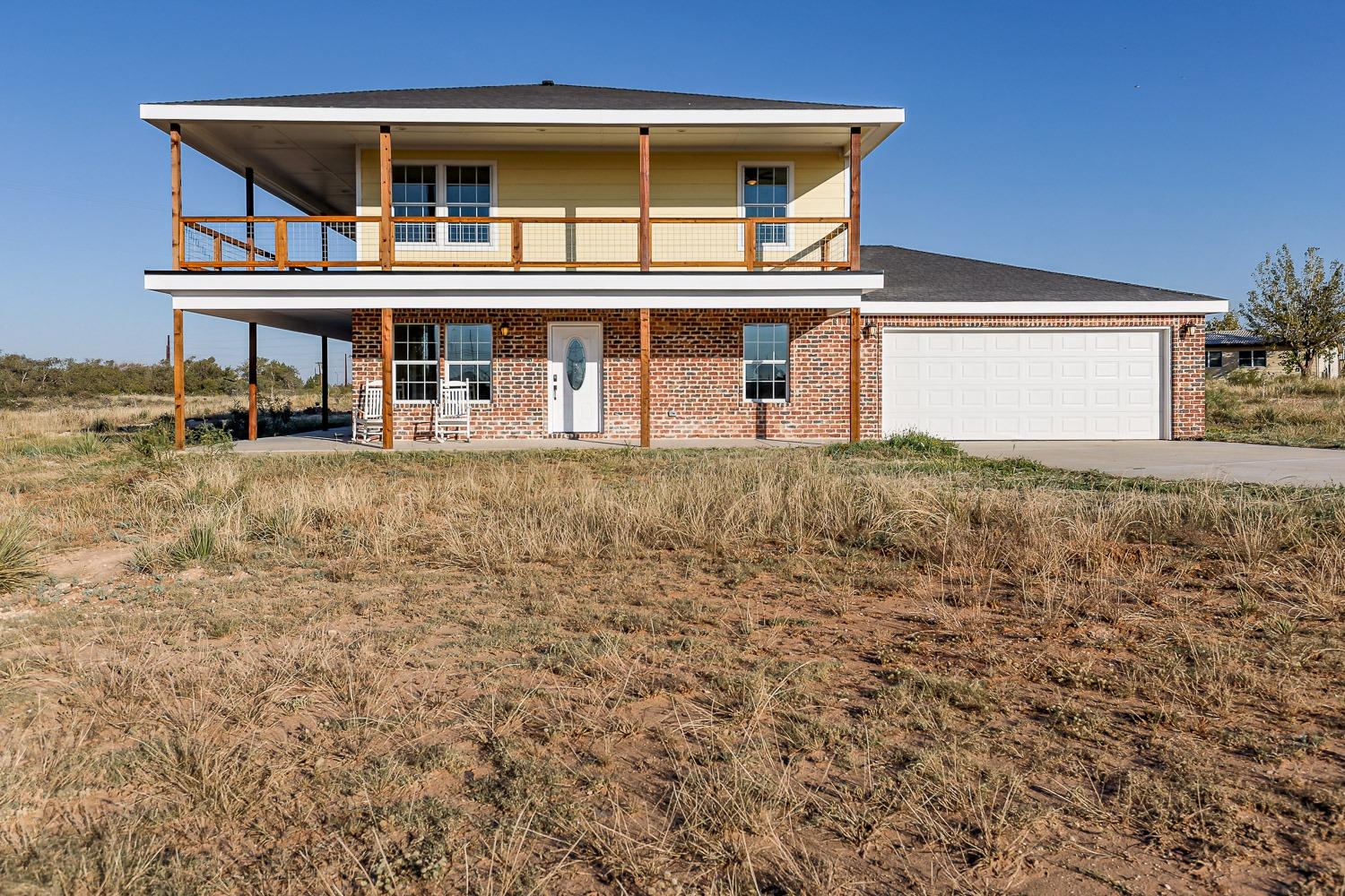 a house view with a outdoor space