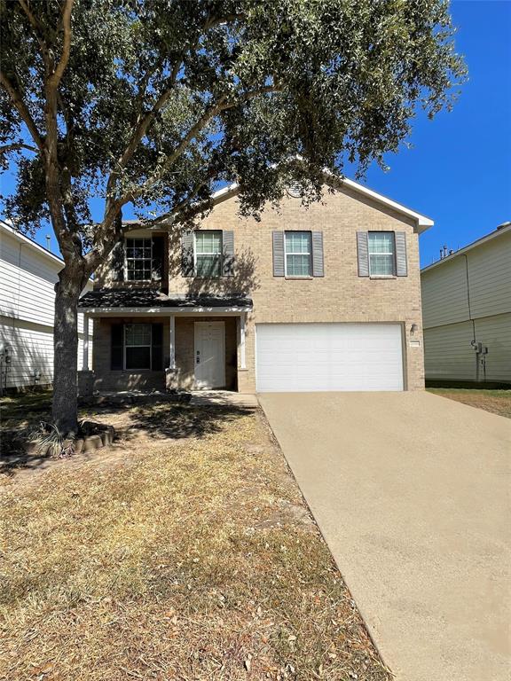 a view of house and yard