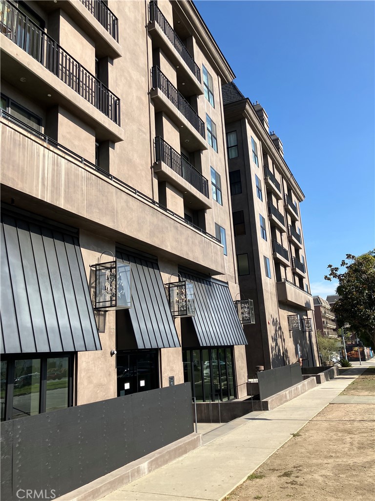 a front view of a building with a street