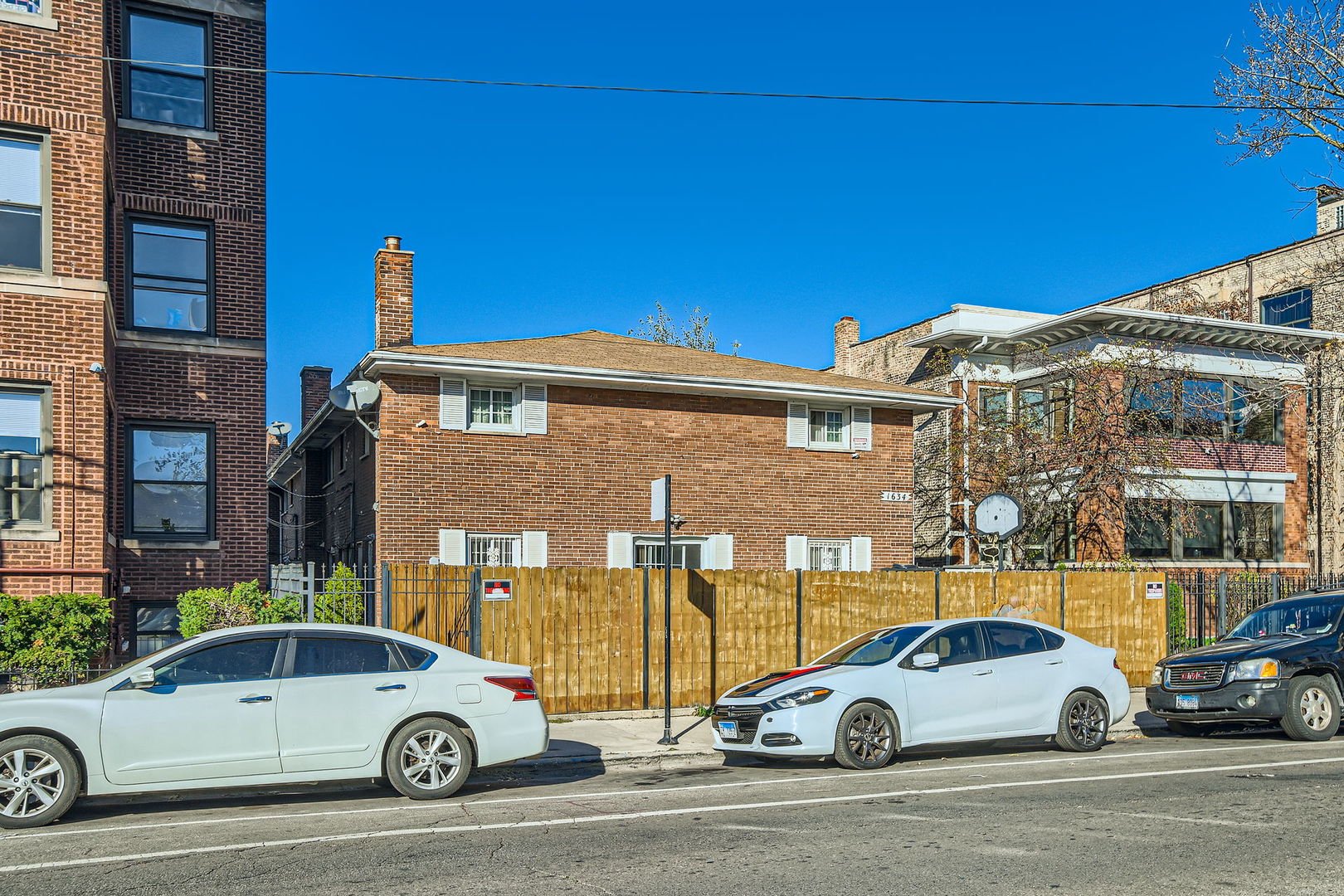 a car parked in front of a house