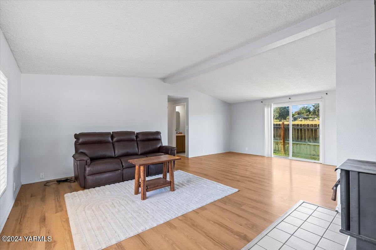 a workspace with furniture hardwood and a window