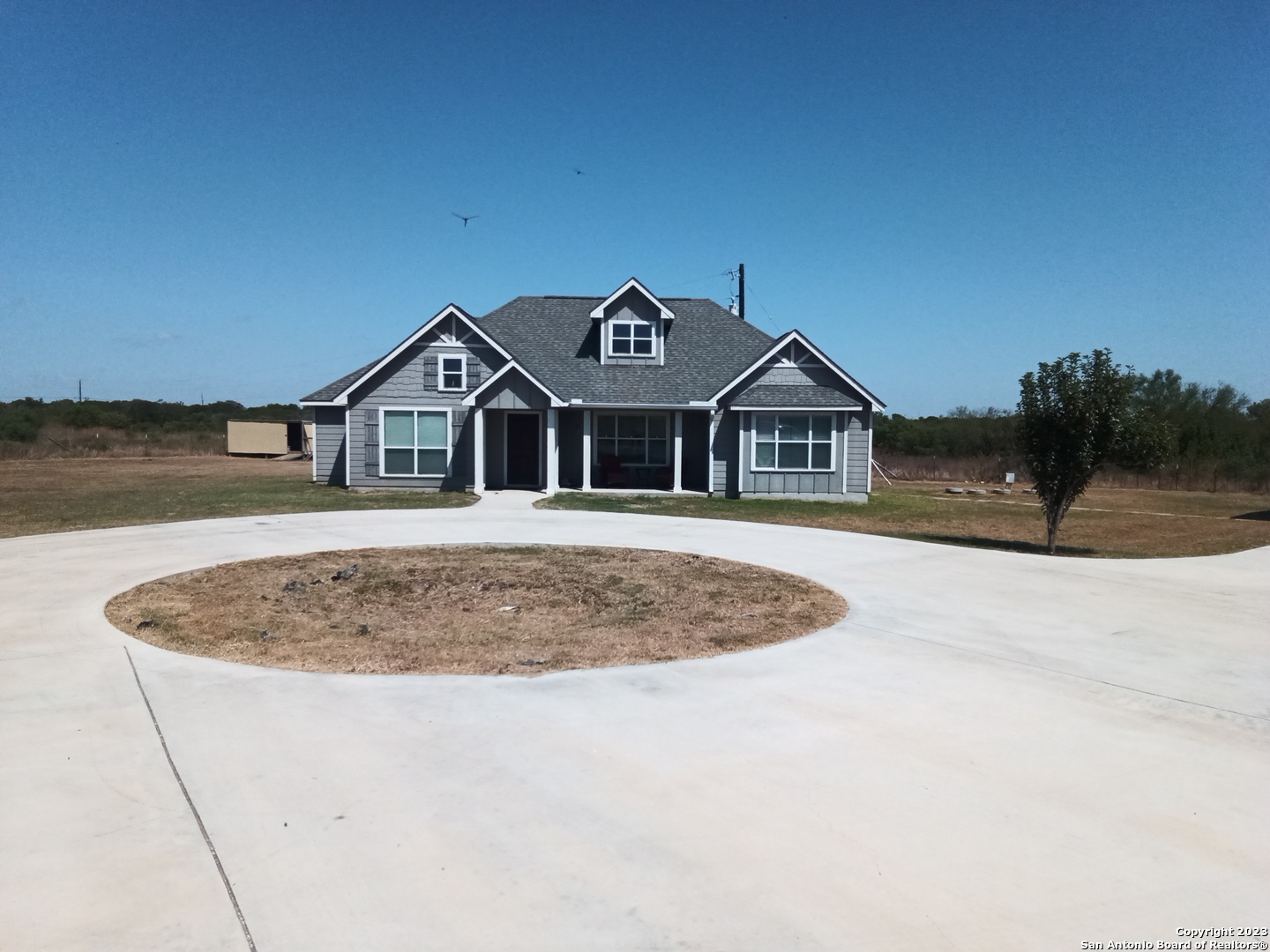 a very nice looking house with a large pool