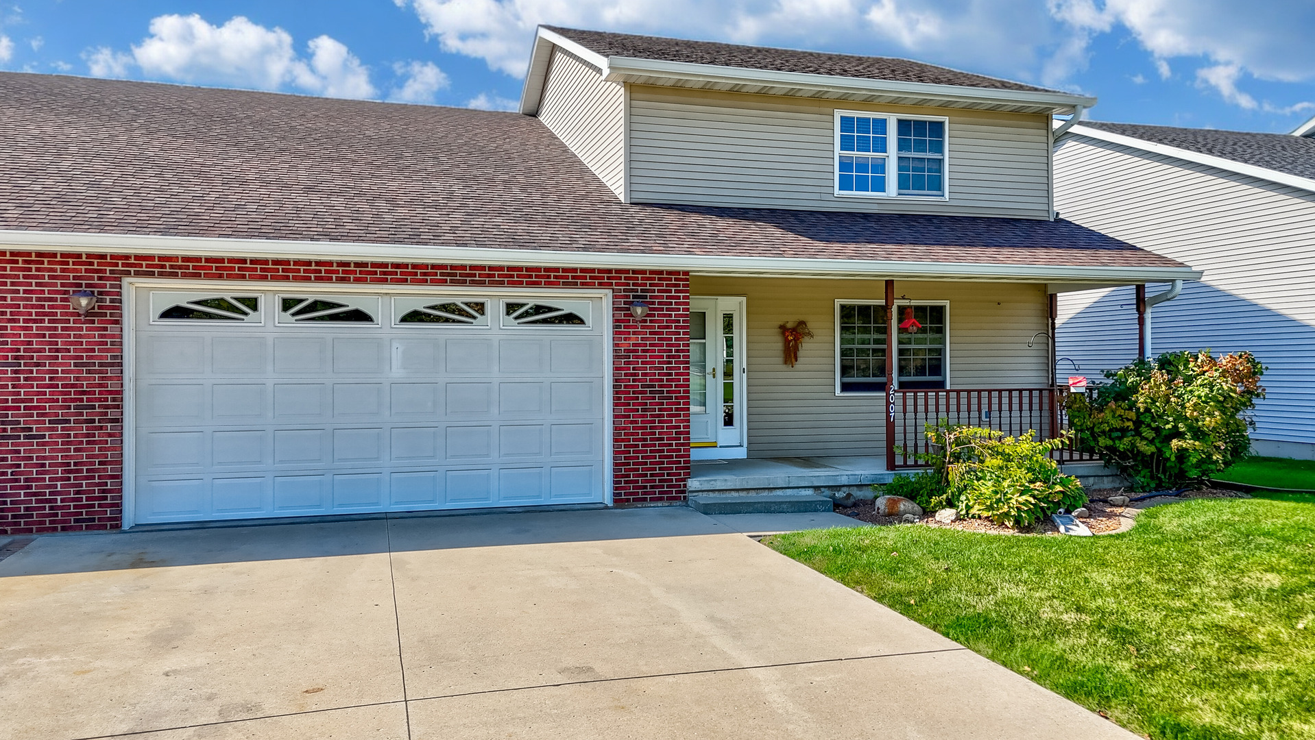 a view of a house with a garage