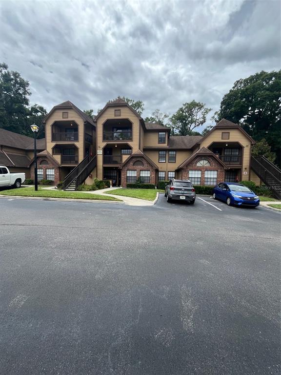 a couple of cars parked in front of houses