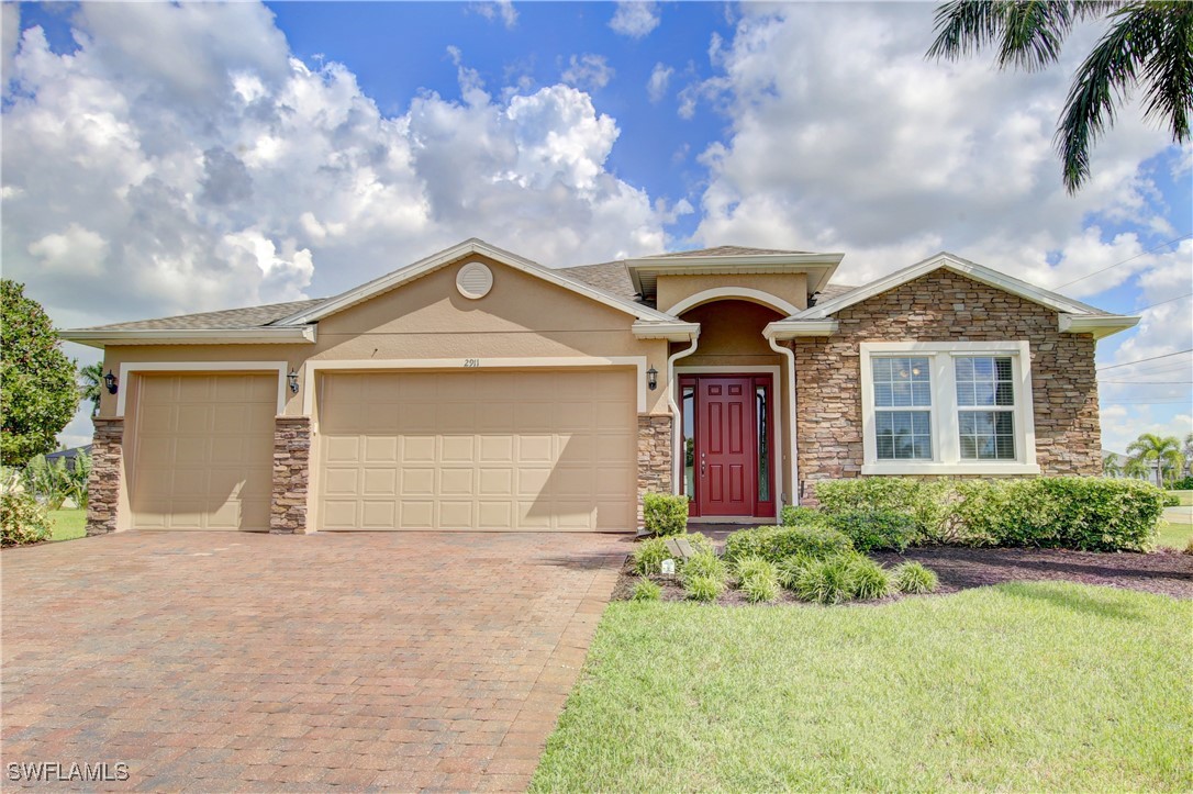 front view of a house with a yard