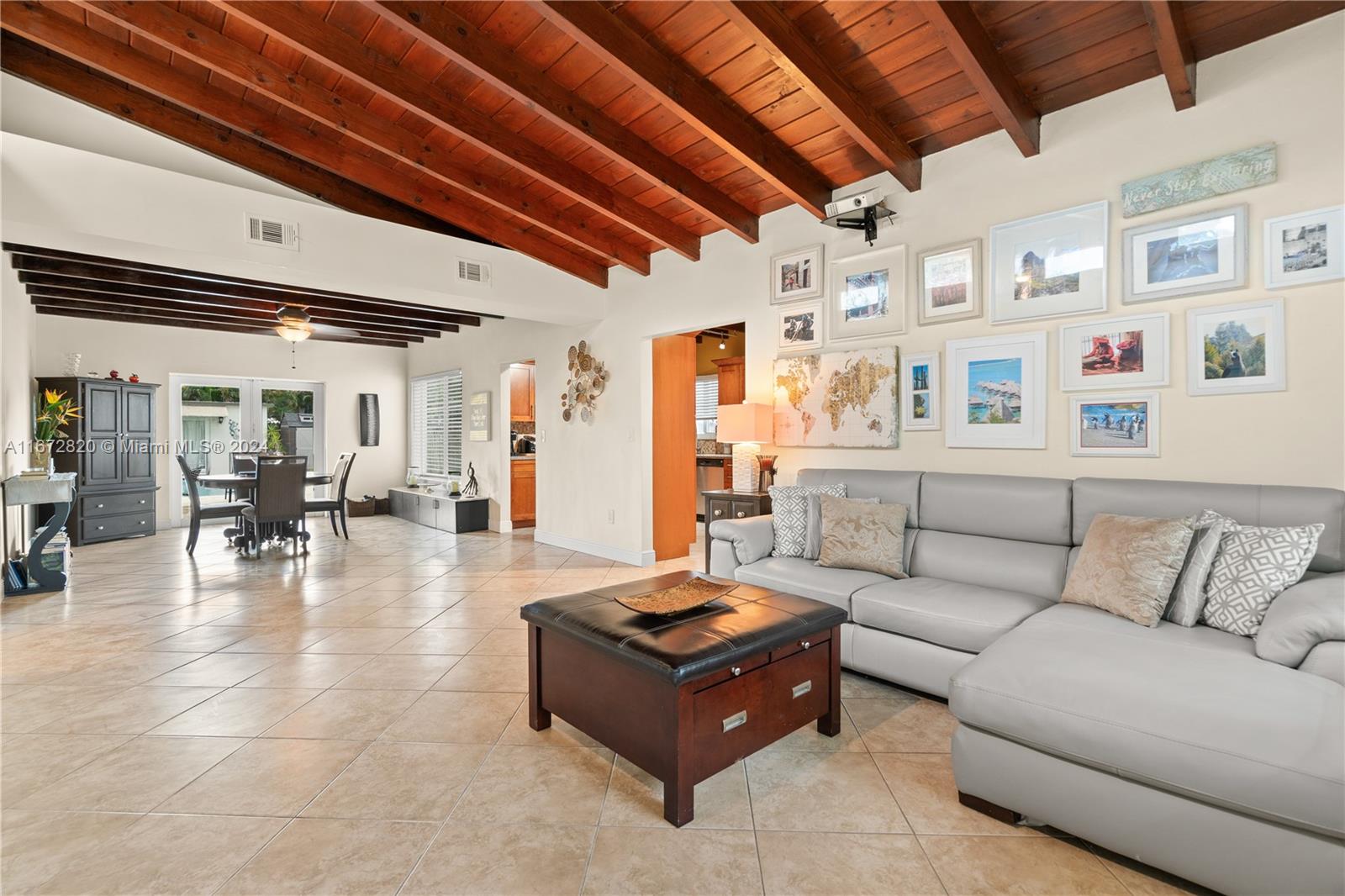 a living room with furniture and white walls