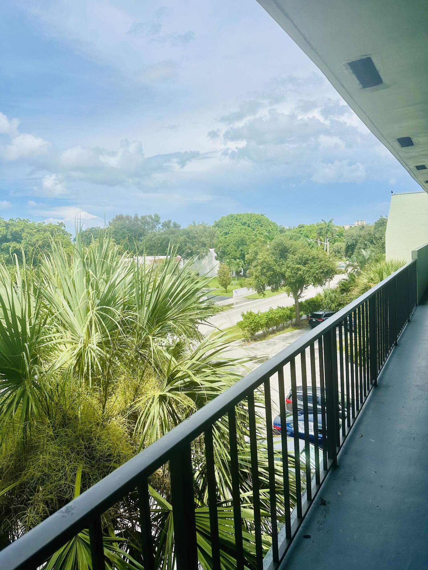 a view of a balcony with an outdoor space