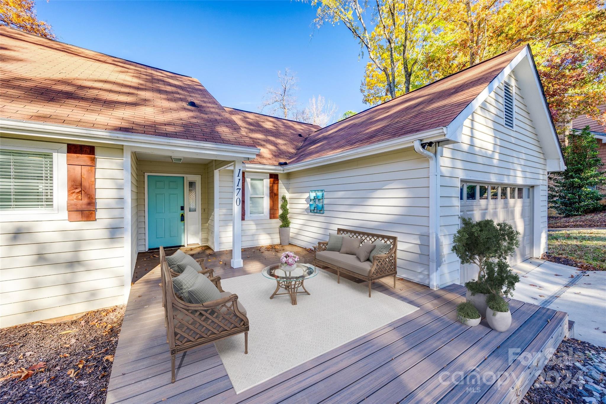 a view of house with patio outdoor seating