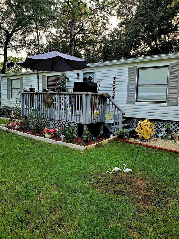 a view of a house with a deck