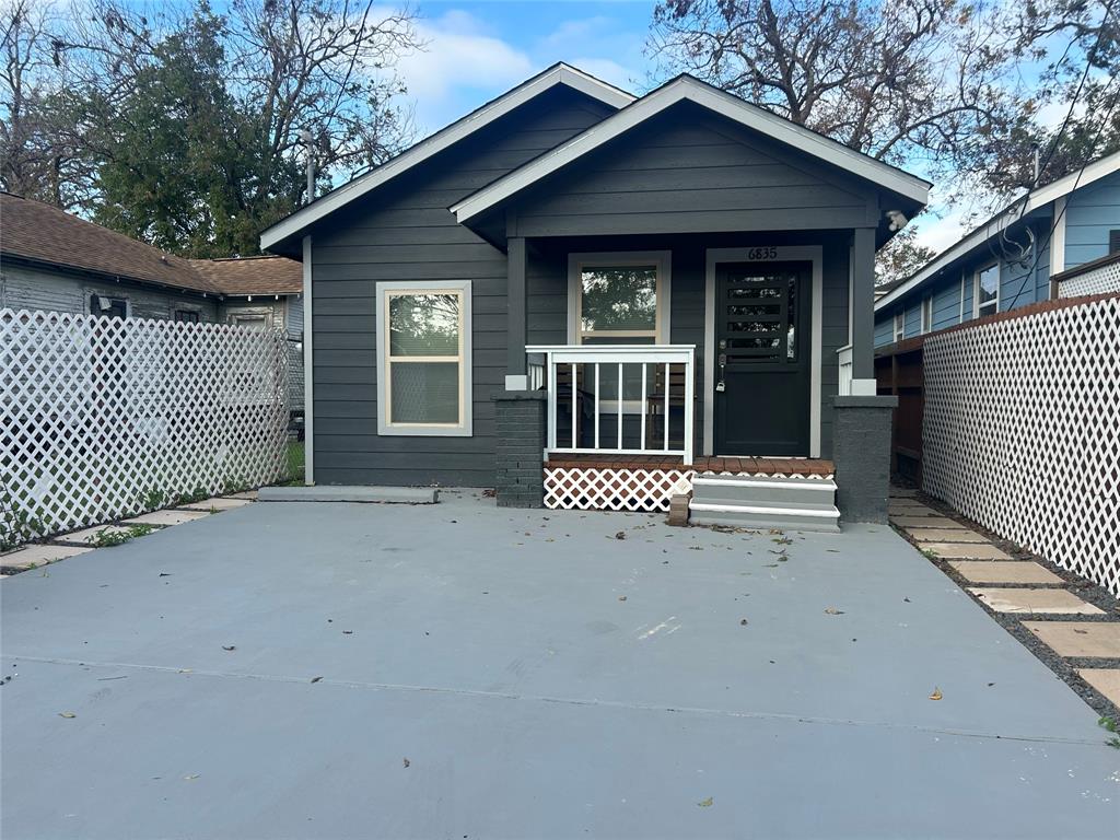 a front view of a house with a porch