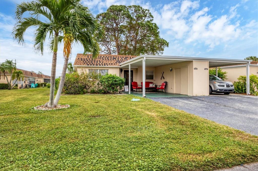 front view of a house with a yard