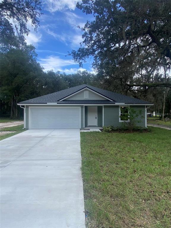 front view of house with a yard