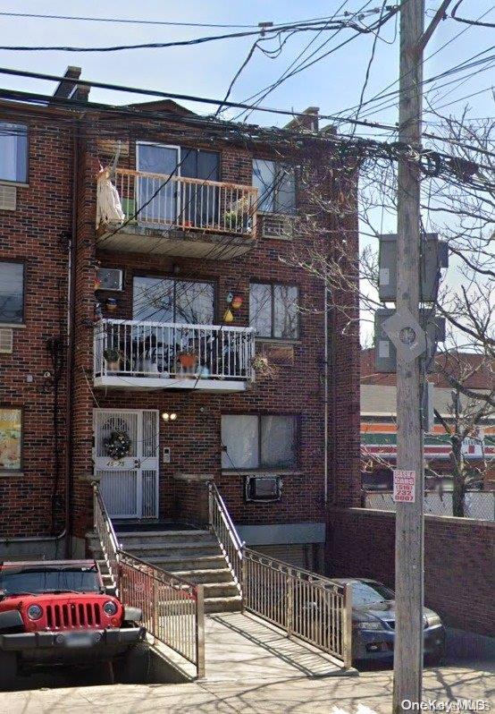 a front view of a building with street