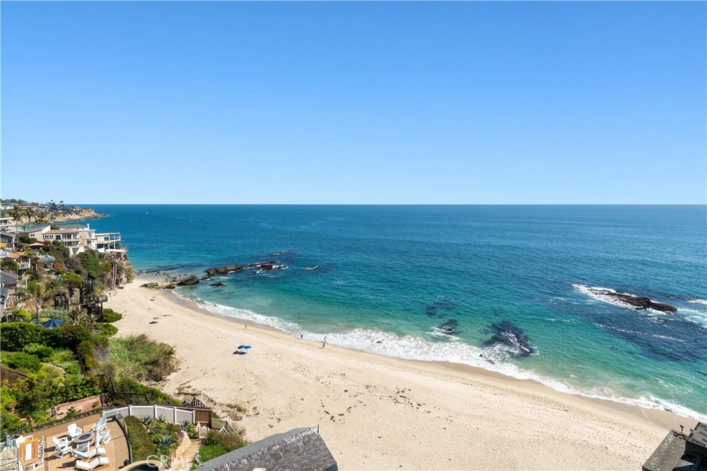 an aerial view of beach and ocean