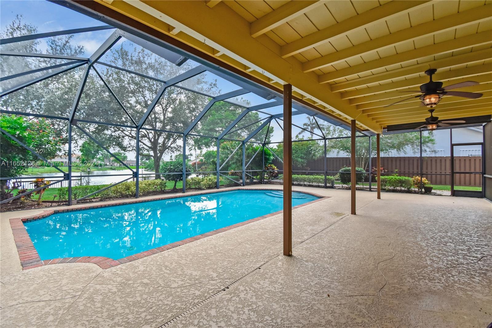 a view of a deck with a backyard