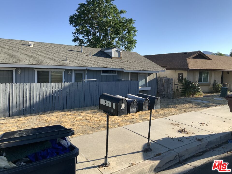 a house view with a outdoor space