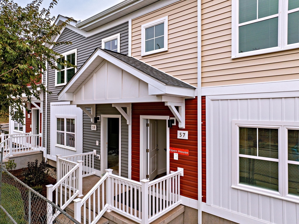 a front view of a house with balcony