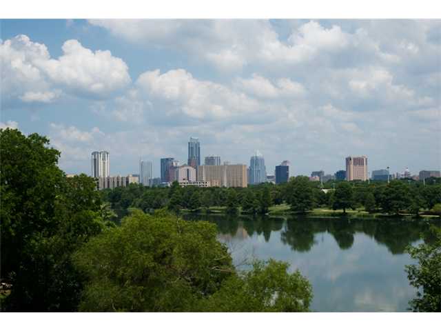 a view of a lake next to a building with a lake