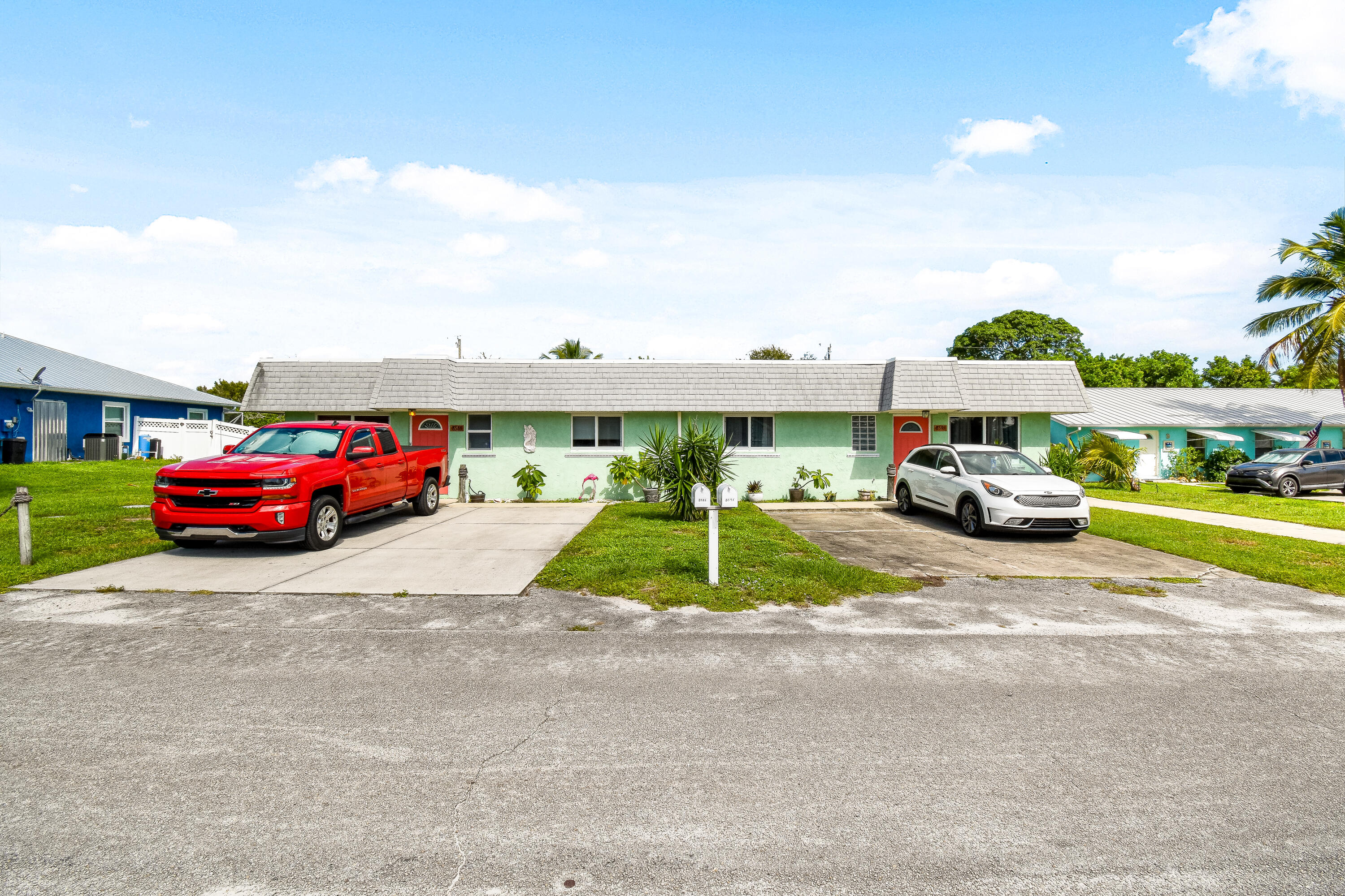 a view of a street with cars